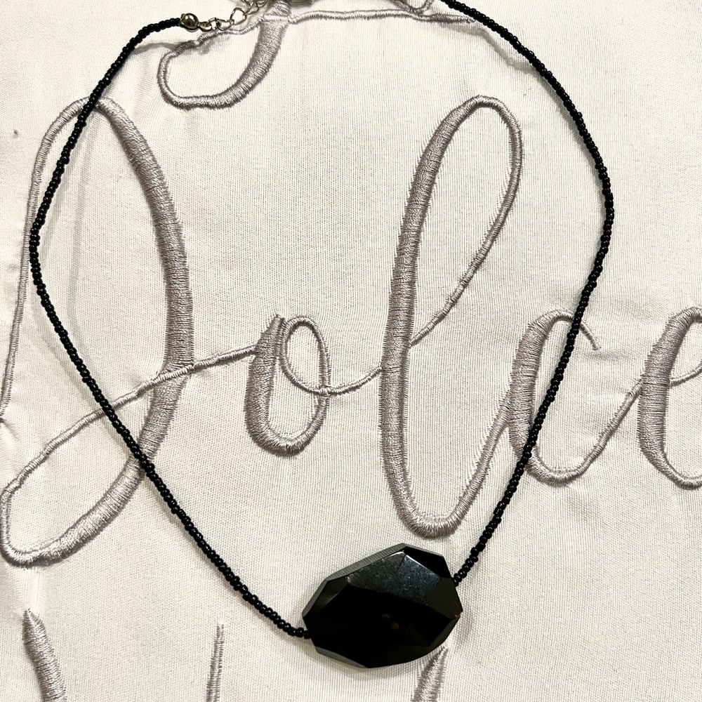 Multi faceted black beaded choker necklace by White House Black Market.